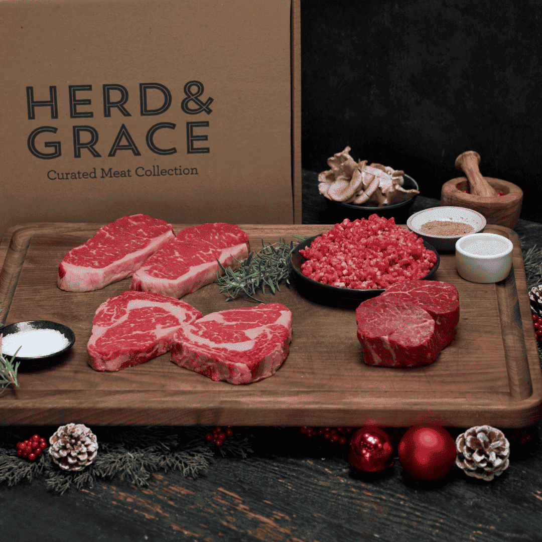 The Complete Wagyu Collection on a wooden board with red wagyu cuts
