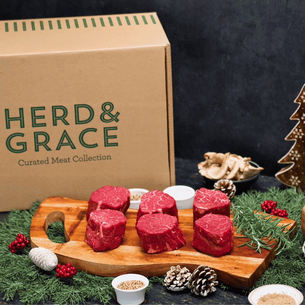 Cape Grim 100 Grass-Fed filet mignon steak box with red steaks on board