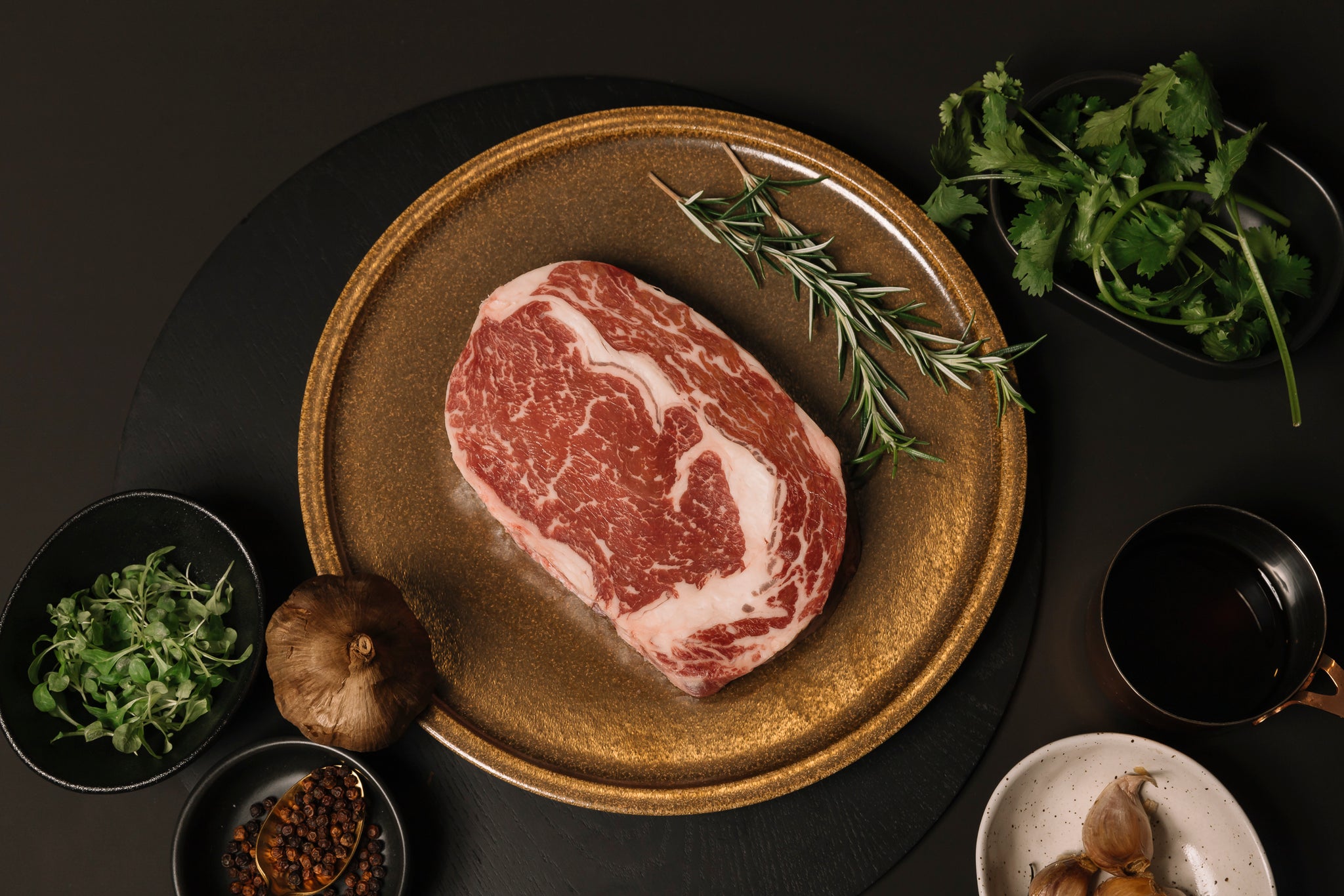 Herd & Grace premium raw Pure Black Angus ribeye steak